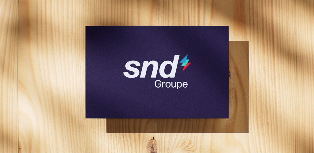 Nouveau logo du Groupe SND sur une carte de visite.